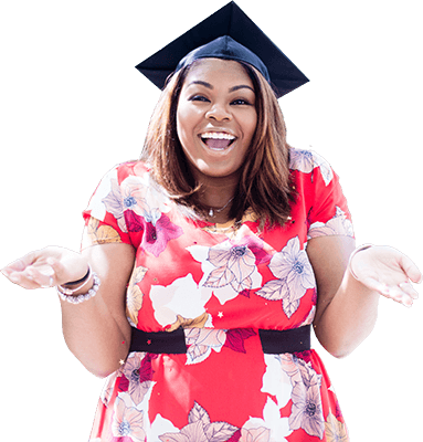Woman wearing graduating cap with arms held out